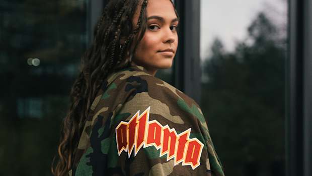 A woman modeling Hawks clothing.
